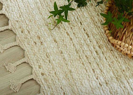 Add a natural touch of texture to your space with woven jute rugs.