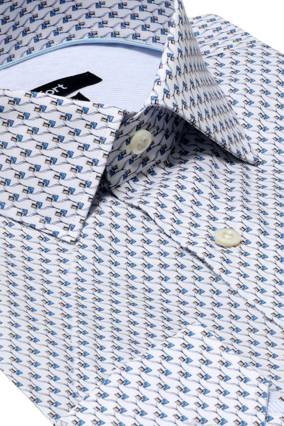 The Cortland shirt is tailored to your personality. The minimalist pattern and subtle contrast fabric details make for a wardrobe essential. Made from high-performance woven cotton with added comfort, it’s timeless essential for every modern man. You’ll enjoy how well our dress shirt holds its shape from day one. DETAILS Men’s luxury dress shirt100% premium luxury cottonContemporary regular fitDeco print designSignature neck pipingContrast mitered cuff and hidden front placket detailSpread colla