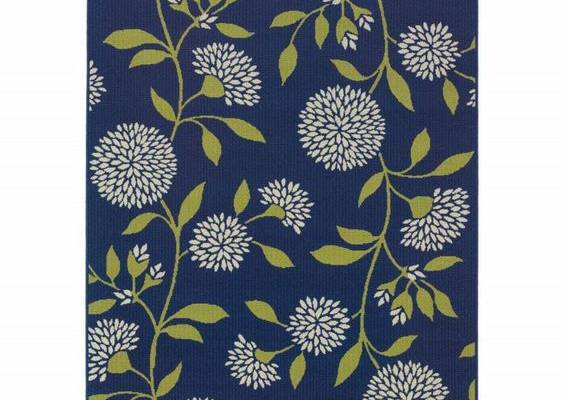 This highly durable Indigo Blue and Lime Green Floral Rug is a striking look with the trend-forward shades of indigo, and lime green in a beautiful pom pom floral design. Machine made of an easy care nylon polypropylene mix, this rug is not only good looking but naturally stain resistant and wipes off with a spray hose. Full of texture and pops of bright color, this rug is high-style, and offers high durability that is perfect for the outdoors or for any room in the home.