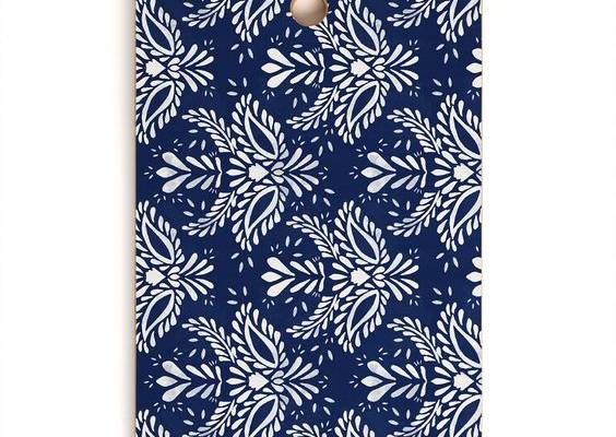 A must-have kitchen accessory, any way you slice it. The Deny cutting board is made from light natural birch wood that won't look too heavy when integrated into your kitchen decor. The display side is printed with a semi-gloss coat that will pop when displayed on your counter or hung on the wall through the 1