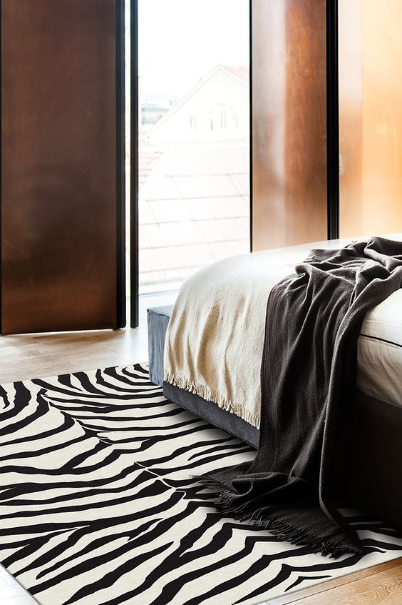Add zest and exotic flair to your current home with our Zebra Black rug. Distinct hues of coconut, pearl, and black make up this quintessential and lively animal design. Place this dynamic accent piece in any room to amplify the energy of your eclectic, modern or contemporary home interior. Ruggable – Washable Rug Cover