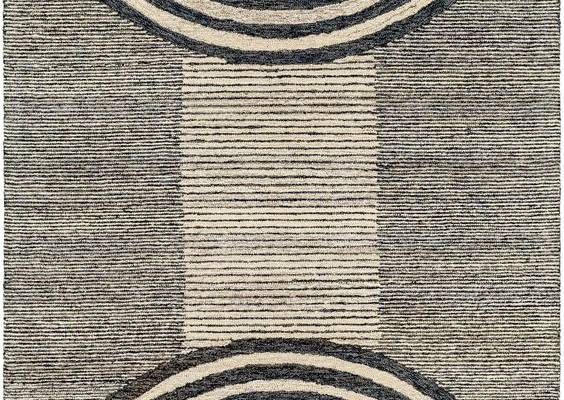 Bold geometric patterns make the Granada 30860 area rug an instant focal point for any interior environment. This dashing area rug is handcrafted by the skilled artisans at Surya, every detail thoughtfully considered for long-lasting appeal in any setting. Durable construction makes Granada collection rugs ideal for homes shared with pets and children. This is a family-friendly design suitable for spaces that experience moderate to heavy foot traffic. Contrasting concentric circles decorate each