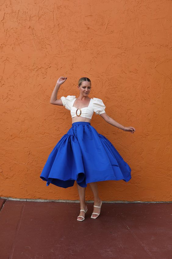 Blair Eadie wearing an Alexander McQueen skirt, Pat Bo top, and Cult Gaia sandals // Click through for more of her summer set picks from Saks Fifth Avenue today on Atlantic-Pacific
