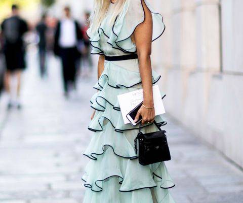 Fashion blogger Charlotte G. of Fashion Guitar wearing a light blue and black ruffled gown and a mini black satchel at Fall 2016 Paris Couture Week.