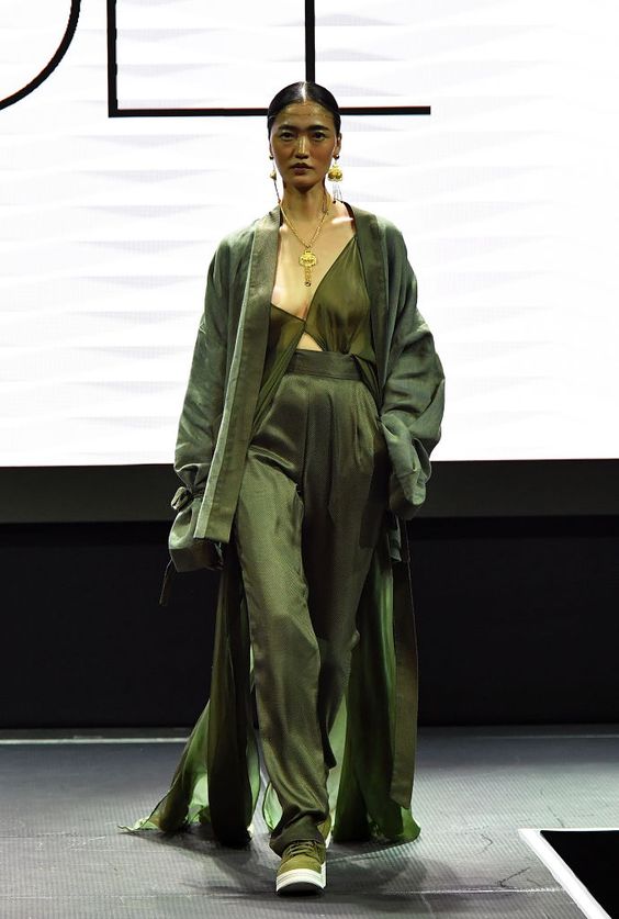 A model walks the runway at Fe Noel fashion show during New York…