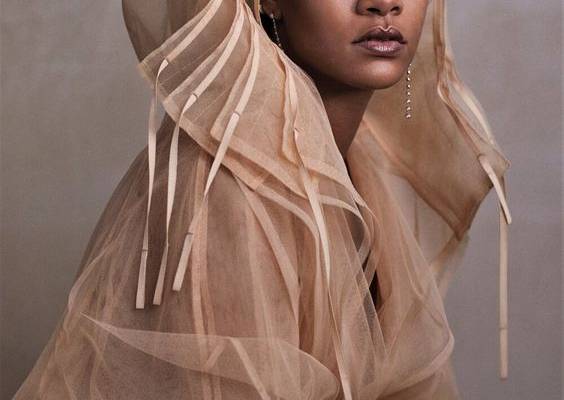 Cover Look  Rihanna wears a Fenty tulle coat. Forevermark and Maria Tash earrings. Hair, Yusef Williams; makeup, Kanako Takase.  Fashion Editor: Tonne Goodman. Photographed by Ethan James Green,  Vogue , November 2019