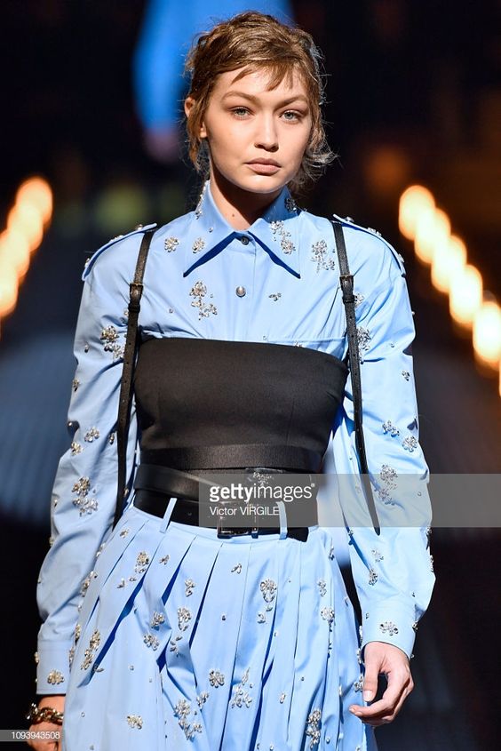 Gigi Hadid walks the runway at the Prada fashion show during Milan…