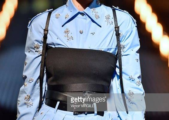 Gigi Hadid walks the runway at the Prada fashion show during Milan...