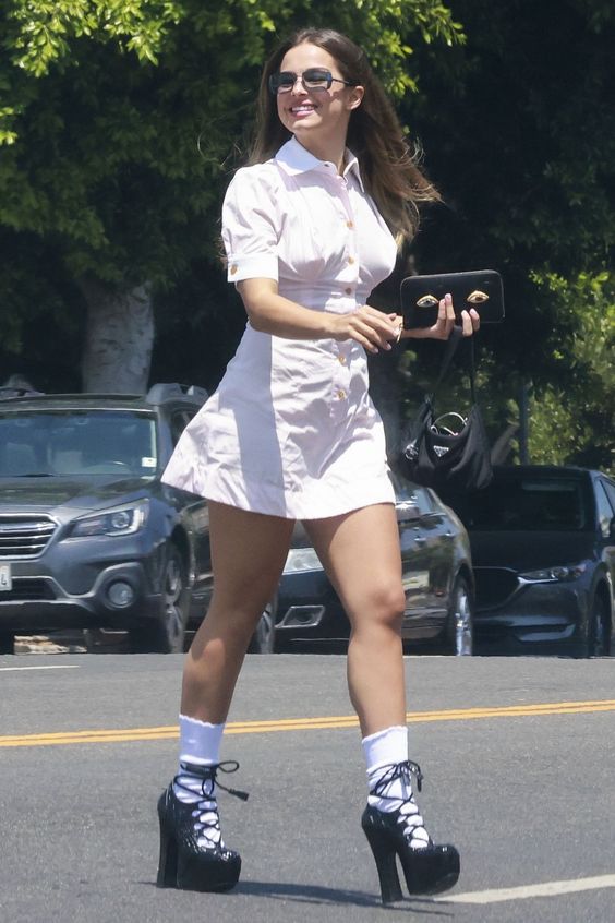 Between her penchant for archival fashion and her almost absurd workout fits, Rae has the makings of a fashion star. Tap to see more.