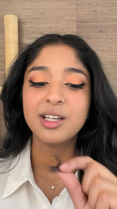 In her episode of Vogue’s Beauty Secrets, Maitreyi Ramakrishnan shares a life-changing tip for applying false lashes. Tap to watch the full episode.