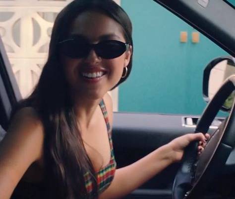 Olivia Rodrigo took a break from her busy schedule to catch up with Vogue before her sophomore album release. Tap to watch.