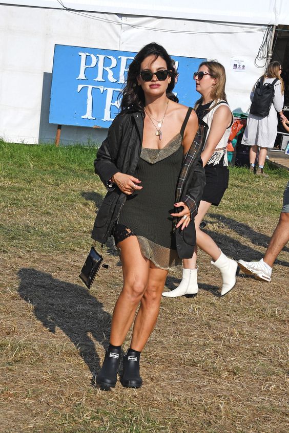 Think designer denim and trophy bags over neon and flower crowns. Tap to see more.