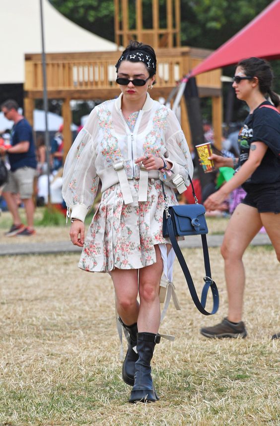 Think designer denim and trophy bags over neon and flower crowns. Tap to see more.