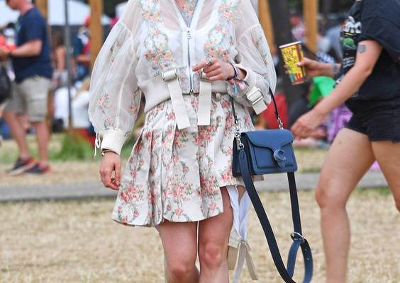 Think designer denim and trophy bags over neon and flower crowns. Tap to see more.