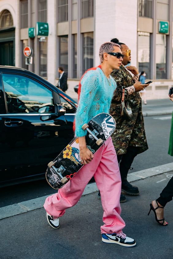 From color-blocking and clashing prints to dresses layered over pants, these street-style looks felt newly experimental. Tap to see the best looks.