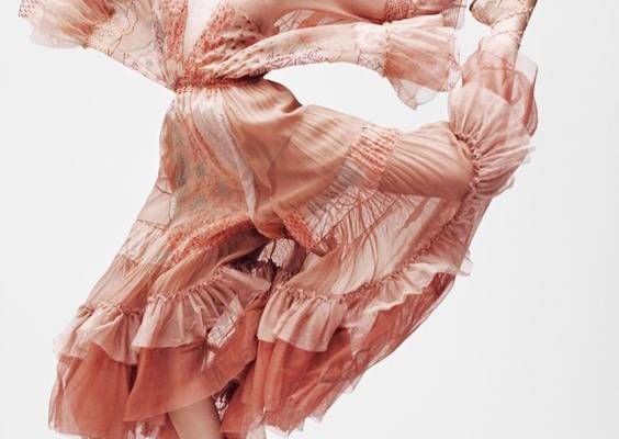 Taking a leap, Sasha Luss models printed dress