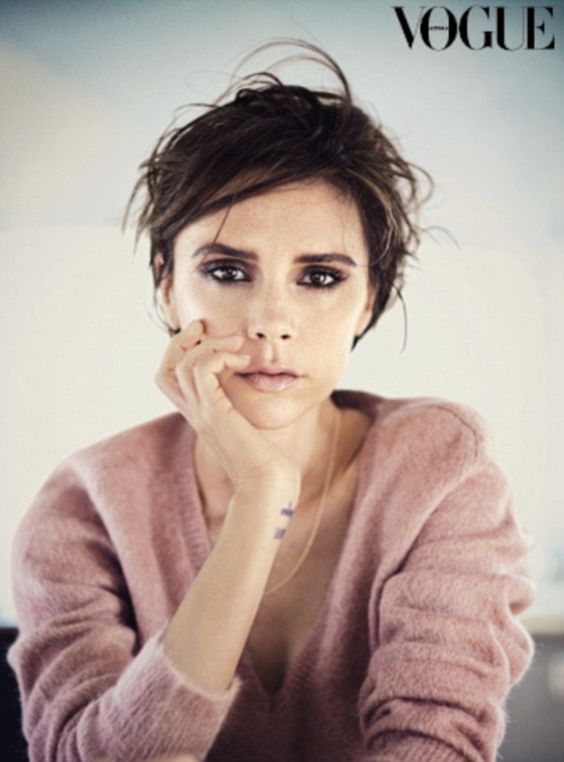 ‘We’re much more normal than people think’: Victoria Beckham opens up about her family life as she poses for another Vogue cover