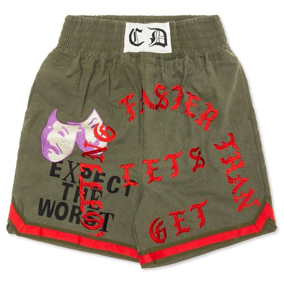 READYMADE was created in 2013 as the vision of designer Yuta Hosokawa. The brand’s theme was world peace. By upcycling military materials, Hosokawa thought turning items used for violence and death into items for pleasure would convey his wish for an end to all war. Pictured is the ReadyMade Boxing Shorts in Green. 100% Cotton Embroidered logo Elastic waistband Side pocket Back zipped pockets Made in Japan Style no: RE-CO-KH-00-00-87