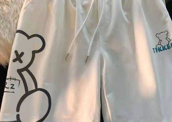 ? Material: TeryleneDecoration: PocketsOrigin: CN(Origin)Waist Type: HIGHPant Style: RegularGender: WOMENFit Type: StraightAge: Ages 18-35 Years OldStyle: Beach StyleModel Number: otherItem Type: ShortsFabric Type: BlendedClosure Type: Elastic WaistMaterial Composition: otherPattern Type: Cartoon