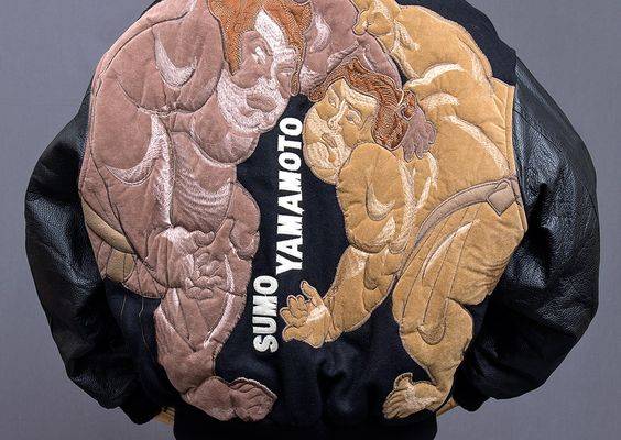 japanesefashionarchive: “ Kansai Yamamoto (山本寛斎) embroidered “SUMO YAMAMOTO” stadium jacket. This is a Kansai Man piece, believed to be early 1990s. Two huge sumo wrestlers face off in the embroidery design on the back. The Kansai name is on the...