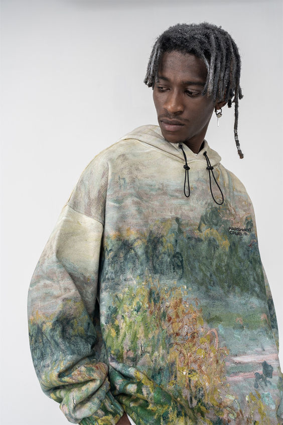 Harsh and Cruel hooded sweatshirt, bungee drawstrings, relaxed hem at waist, elasticated cuffs, all-over graphic sublimation print on french terry cotton fleece. Composition – 100% French Terry