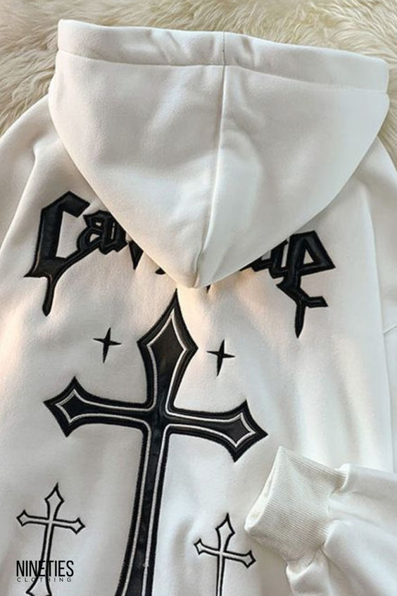 Elevate your streetwear game with the NTC® Retro Cross Hoodie. This vintage-inspired hoodie combines timeless style with a unique cross design, making it a must-have addition to your wardrobe. Whether you’re going for a casual urban look or aiming for a fashion-forward statement, this hoodie has you covered. Stand out from the crowd with its retro-chic silhouette and effortlessly cool vibes. Shop now and embrace the blend of fashion and comfort with the NTC® Retro Cross Hoodie.