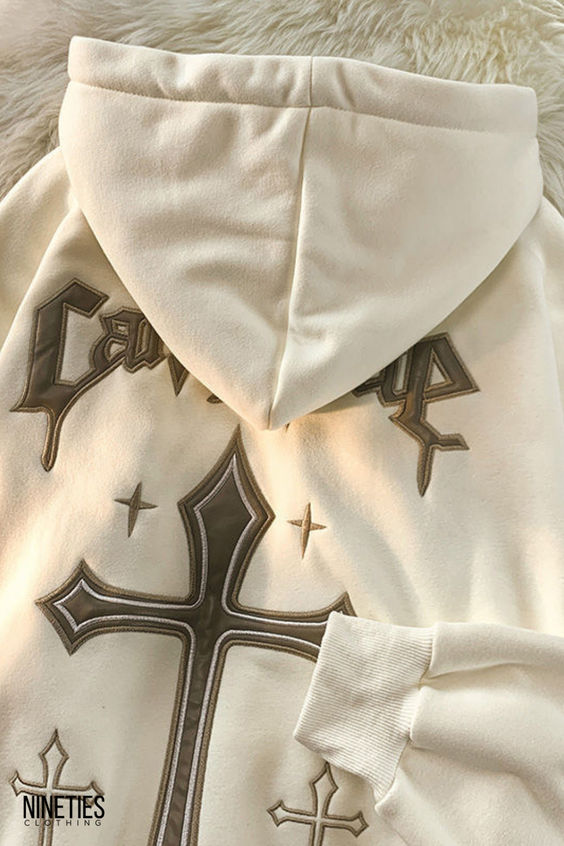 Elevate your streetwear game with the NTC® Retro Cross Hoodie. This vintage-inspired hoodie combines timeless style with a unique cross design, making it a must-have addition to your wardrobe. Whether you’re going for a casual urban look or aiming for a fashion-forward statement, this hoodie has you covered. Stand out from the crowd with its retro-chic silhouette and effortlessly cool vibes. Shop now and embrace the blend of fashion and comfort with the NTC® Retro Cross Hoodie.