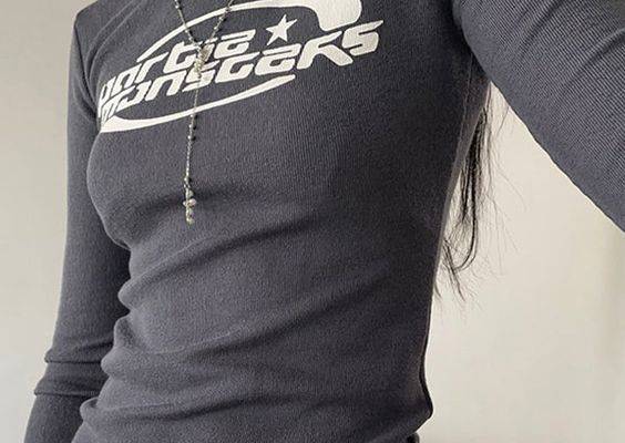 Style: Casual/Street/Y2K/Sweet/Vintage/PreppyFabric Content: Cotton. SpandexFit Type: Slim fitNeckline: Crew NeckSleeve Length: Long Sleeve·Nostalgic Y2K Style: This crop top is perfect for those who want to embrace the Y2K trend and relive the early 2000s nostalgia. Its retro-vibe design is sure to make a statement and catch people's attention.·Comfy