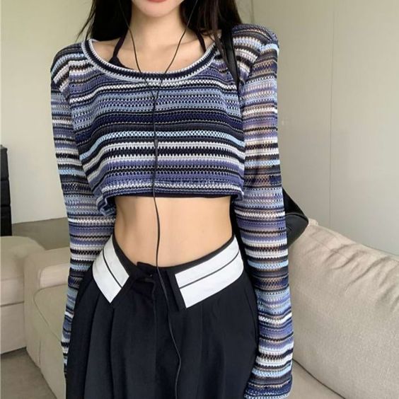 Elevate any look in comfort with the Stripe Wide Neck Knit Cropped Top. Crafted from a soft and lightweight knit fabric, this versatile top is the perfect layer for any outfit. With its casual look and wide neck design, it can be easily paired with high waist bottoms and any kind of shirt. Style it up or down for any occasion.
Gender: WomenMaterial: PolyesterClothing Length: ShortSleeve Length: Long SleeveSleeve Type: Regular