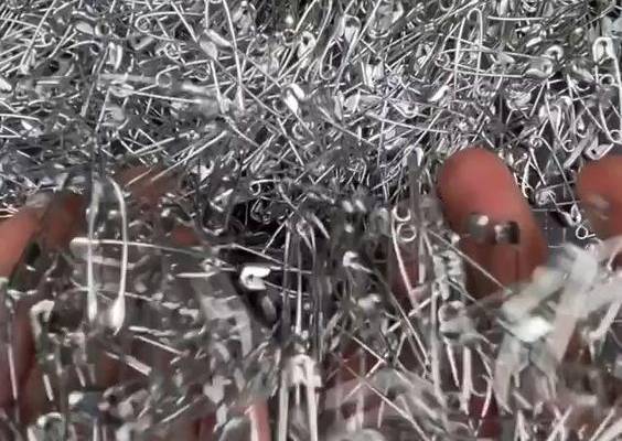 Fashion Trendsetter Creates Dresses with Safety Pins