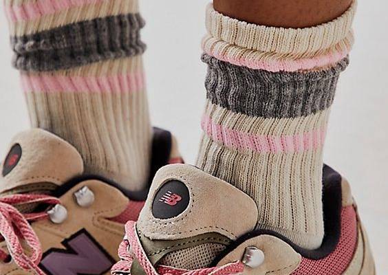 Classic sporty crew socks featured in a wide ribbed design with striped details at the ankle.* Calf-high rise* Comfortable fit