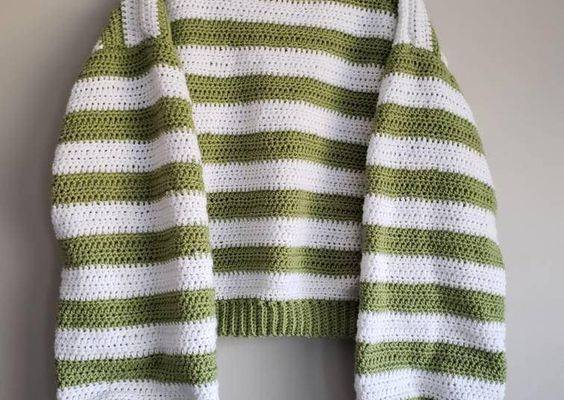 Get ready for the winter weather with this Custom Over Sized Striped Crochet Cropped Sweater !!  Made by hand with super soft acrylic yarn, this jumper is sure to keep you warm all year-round ! This sweater comes slightly cropped and over-sized with the option of custom colors and sizing, so you can be sure to get the perfect sweater for you or your loved ones !! Feel free to let me know if you would like the sweater less cropped or if you have any questions about sizing