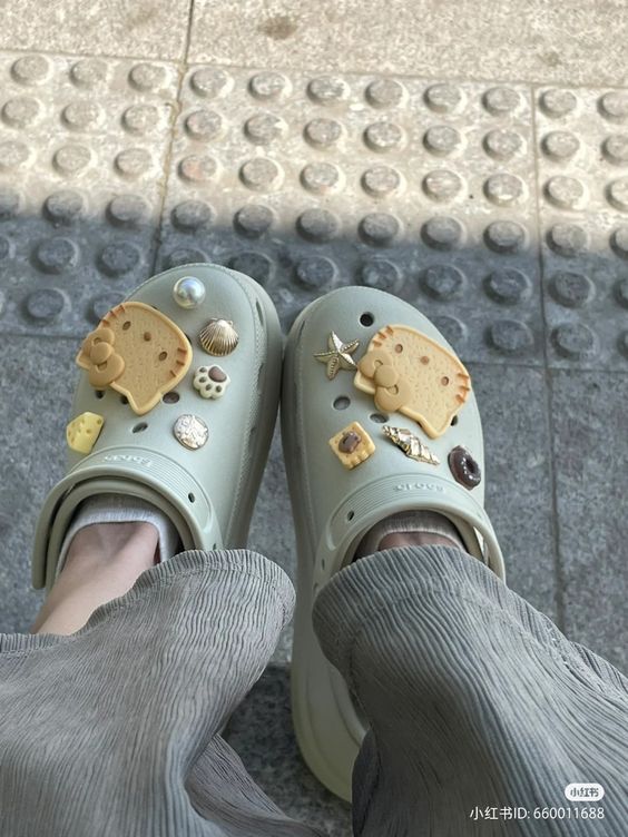 blue/green hello kitty sanrio crocs