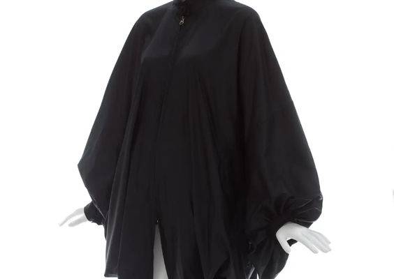 For Sale on 1stDibs - Issey Miyake; Black nylon oversized parachute coat with batwing sleeves and two front pockets Fall-Winter 1987