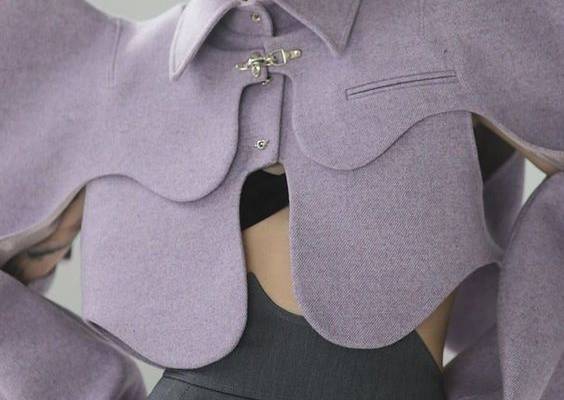 Noone Collection is all about pushing the boundaries of street, avant-garde, and trendy fashion. This Petal jacket is a fashion-forward take on a bolero, with curvy cuts and interestly placed cutouts. It can also be combined with the midnight blue version of this jacket and make it a two-tone look. Material: CottonMaterial: PolyesterStyle: Fashion ForwardCollar: Turn-down CollarClosure Type: Single BreastedSleeve Style: RegularSleeve Length(cm): FullType: LOOSEOuterwear Type: Wool