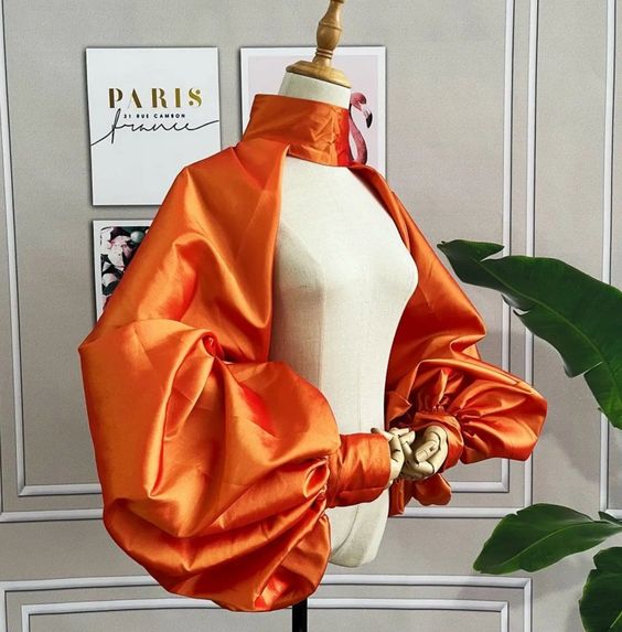 “Taffetta High Neck Open Back/Front Full Puff Sleeve Bolero. *Bolero Only One size or you may submit your custom measurements with order in the \”note to shop\” designated area. Wrist size of sleeves: 6.29\”-7.08\” or 16-18cm. Our standard one size fits average US sizes 2-14 If you believe you might need a bigger size or you need a color not listed, please contact us and we will see if we can be of help.”