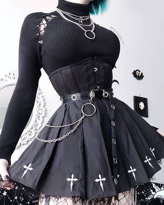 Nothing says classic like a corset and a skirt with crosses 🔪🤍🖤