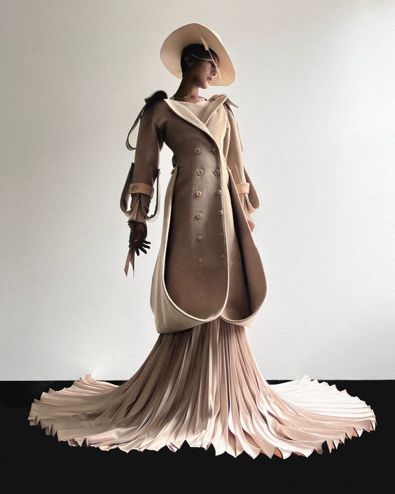 Dramatic Flares and Organic Swells Burst from Robert Wun’s Avian-Inspired Garments