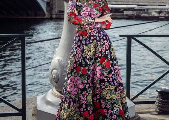 This particular cocktail dress is both elegant and whimsical. Colourful embroidery from the neckline down to the bottom of the skirt adds a touch that is both elegant and edgy. The lining is made of natural silk and can be chosen as either a skirt or shorts. This unique, gorgeous floral evening maxi dress offers a colourful, artsy alternative to your formalwear wardrobe. Additional Information  Description Polyester on Nylon mesh The underparts made of 100% Silk: undershirt, shorts, skirt (60 cm