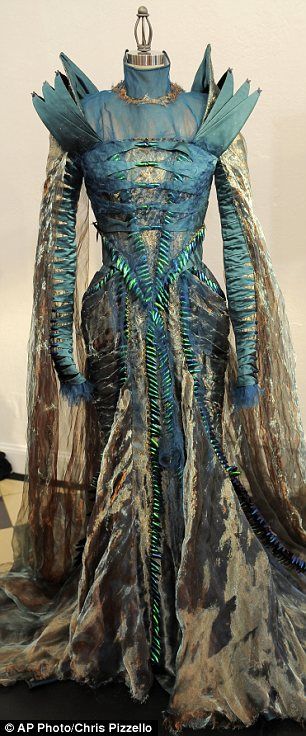 A dress made of beetles wings from the film Snow White And The Huntsman was worn by actress Charlize Theron