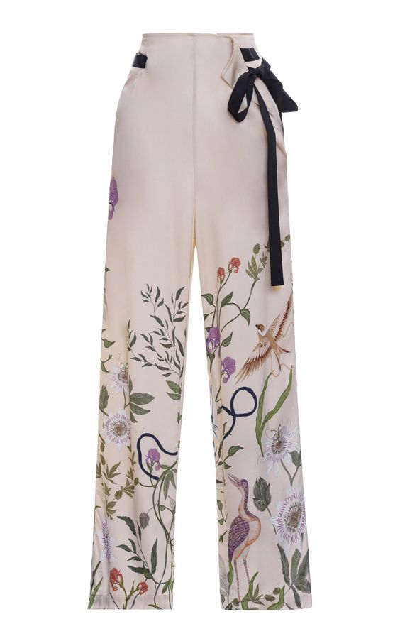 For their latest collection, Colombia’s authority on botanical-strewn romance returns with fresh references, added texture, and reimagined silhouettes. Alongside their signature hyper-feminine dresses and matching sets, pieces come alive with quilted fabrics, intricate florals, fringe, and the rich embroideries that first propelled the brand to fame. These high-waisted pants have a wide leg silhouette and waist ties. Pair with the [matching blouse](https://www.modaoperandi.com/women/p/agua-by-ag