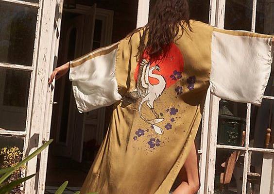 Featuring a colorful and statement design on the back, this maxi kimono is featuring in a silky fabric and shapeless silhouette. * Wide sleeves* Maxi length* Arm vents