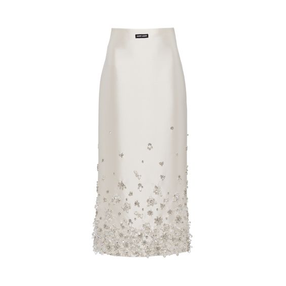 Sheath silhouette Lined garment Back slit Back zipper closure Knit logo label