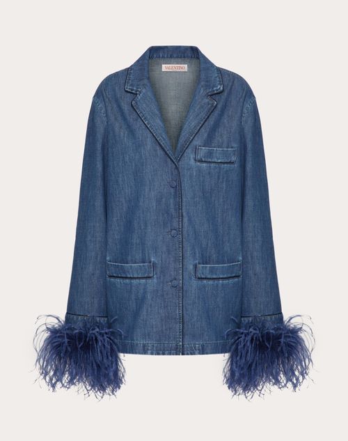 Valentino Chambray Denim Shirt With Feathers – Feather embroidery at cuffs – Front button closure – Chambray Denim (100% Cotton) – Unlined – Length: 73 cm / 28.7 in. from the shoulders in an Italian size 40 – The model is 176 cm / 5’9″ tall and wears an Italian size 40 – Made in Italy The look of the model is completed by a Valentino Garavani VLogo Signature Bag and Valentino Garavani VLogo Chain Shoes.