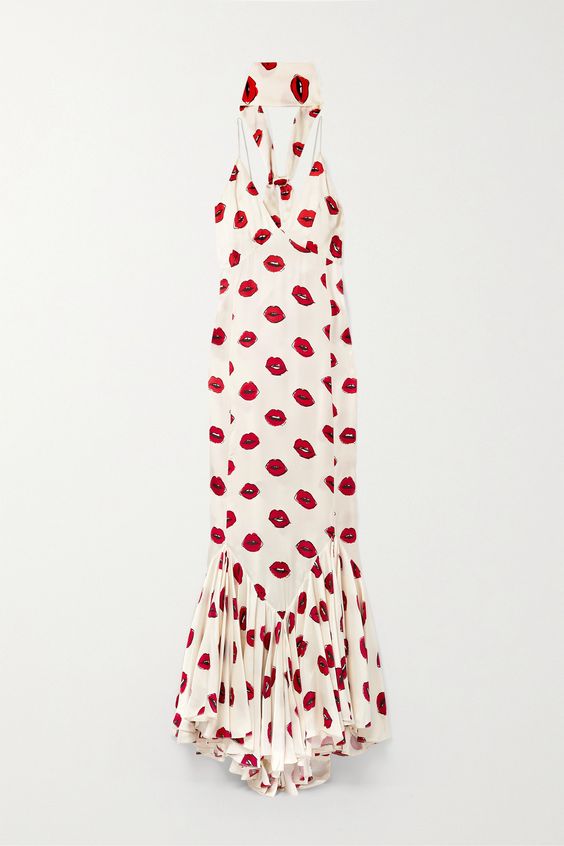 Khaite’s ‘Candita’ dress is the picture of elegance. Made from lustrous twill printed with red lips that appear to be drawn on, it closely skims your frame before flaring out in dramatic folds at the maxi hem. Knot the scarf loosely around your neck so it drapes down the back.