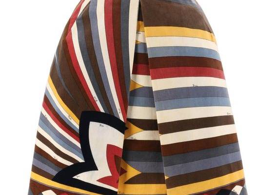 EMILIO PUCCI c.1960’s Multi-color Velvet Signature Print A-Line Pleated Skirt Circa: 1960’s Label(s): Emilio Pucci / Exclusively for Sak’s Fifth Avenue. Style: A-line skirt Color(s): Shades of brown, cream, yellow, red, blue, grey and black. Lined: Yes Marked Fabric Content: 100% Cotton Additional Details / Inclusions: Front pleated skirt with darts at waistline; banded waistline; left seam zipper with hook and eye closure at top; lined; cotton velveteen fabric. Made In: Italy Additional Packagi