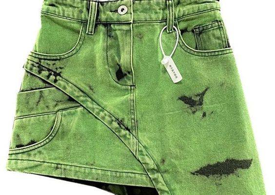 Introducing the trendsetting Dana Asymmetric Skirt, the perfect addition to your wardrobe for a fashionable and edgy look. The unique asymmetrical design of the skirt with sashes adds a touch of style and elegance to your overall look. Made with high-quality cotton and polyester, this skirt is comfortable and durable,