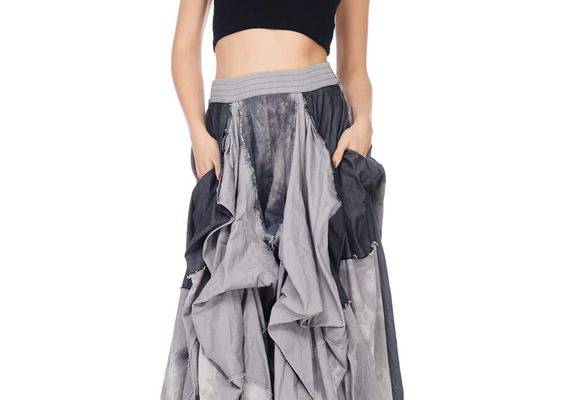 PRICES MAY VARY. Denim,Polyester,Cotton 95% Cotton, 5% Polyester Floor length maxi skirt Elasticized waistband Side slash pockets Split at sides Floor length maxi skirt with 2 denim side pockets and ruffled pleats.