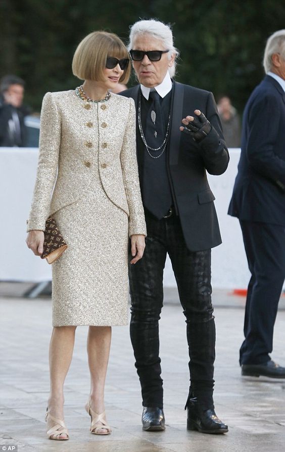 Michelle Williams shows off her slim legs in make-up print mini dress