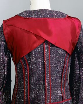 A half lining protects the fashion fabric from the wear and tear of upper back movement and prevents the shape of interior construction deta...